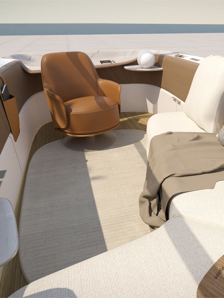 Le design intérieur de Poliform pour le concept Audi urbansphere montre un intérieur confortable avec de nombreux coussins et un fauteuil.