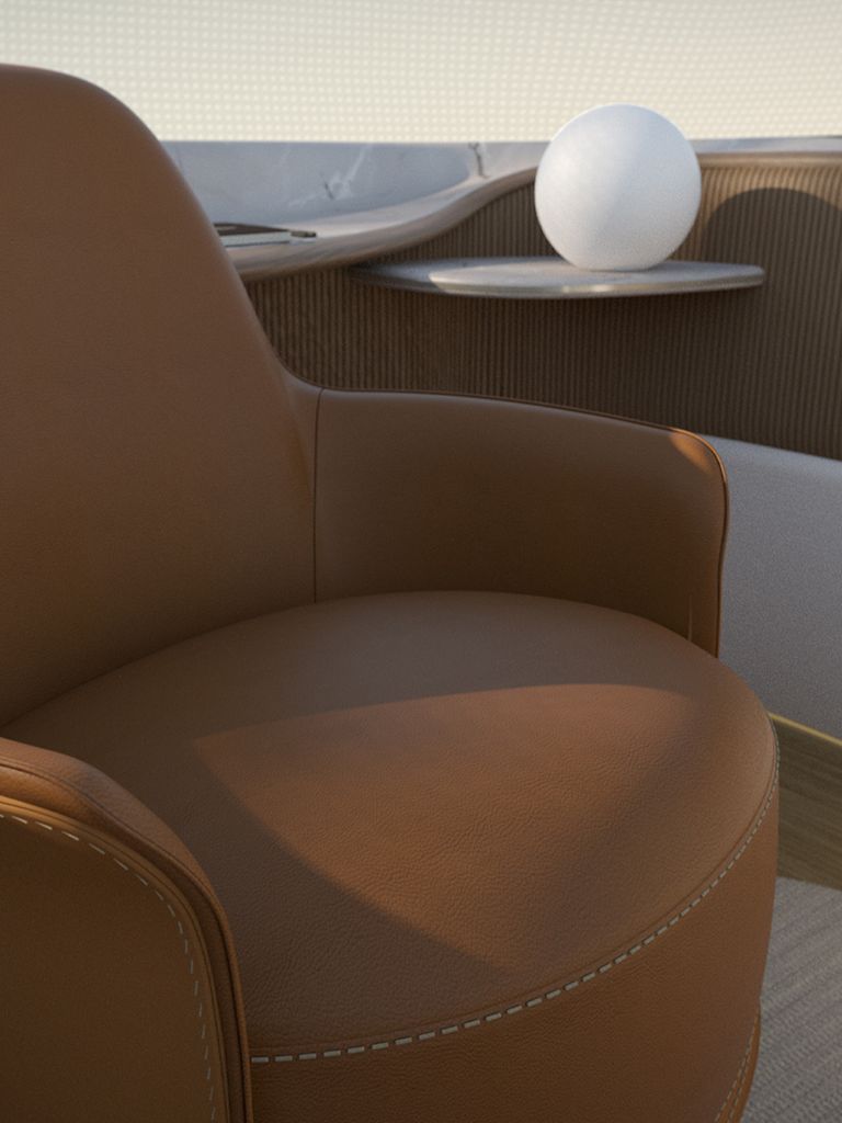 Le design intérieur de Poliform montre un fauteuil marron.